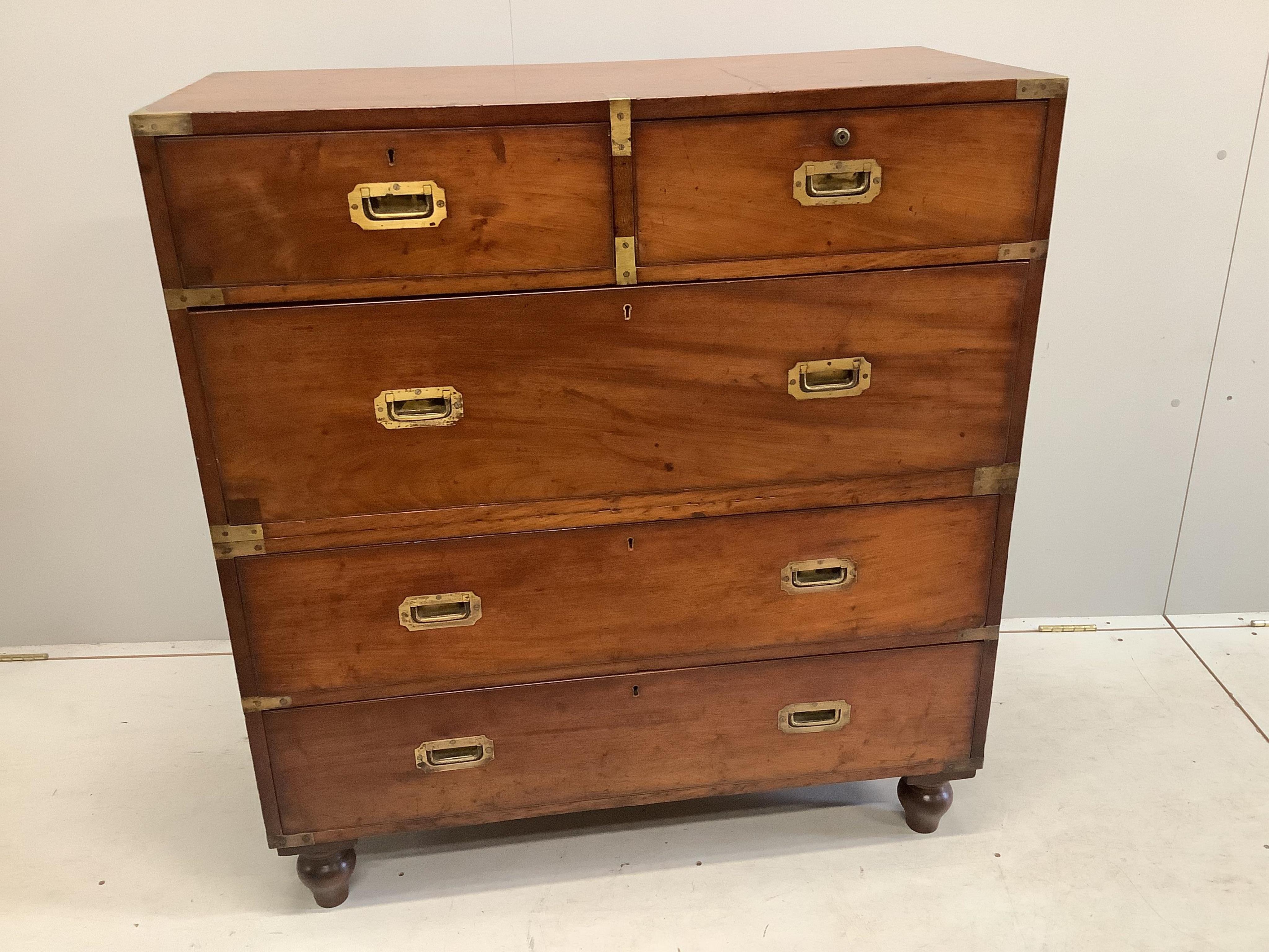 A late 19th century brass mounted mahogany two part military chest, width 99cm, depth 45cm, height 109cm. Condition - fair to good